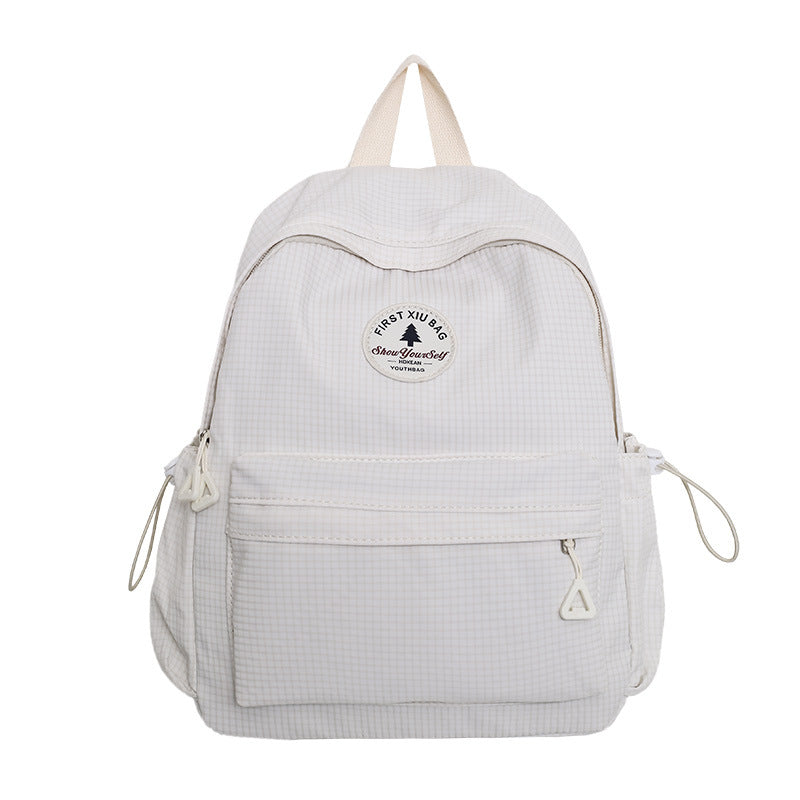 A light gray and white gingham backpack with a circular 'PREY OR DIE' logo patch on the front, shown against a plain white background.